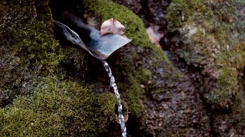 Clear potable raw water source. Spring water chute, pure mineral water gutter. Stock Footage 117153769