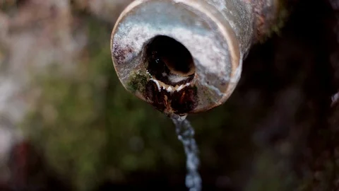 Clear potable raw water source. Spring water chute, pure mineral water gutter. Stock Footage 117154034