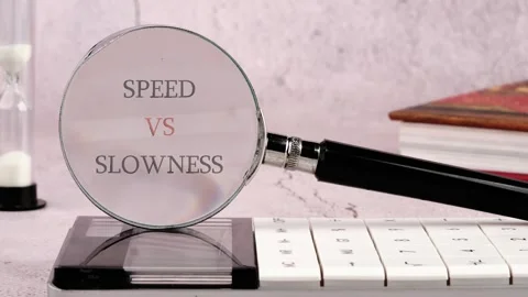 A clear presentation shows the terms speed and slowness using a magnifying Stock Footage 337004270