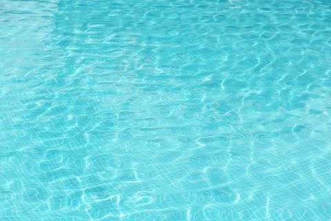 Clear refreshing water in swimming pool, closeup 写真素材