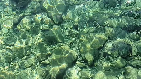 Clear Rocks Ocean Super slow motion Stock Footage 229863182