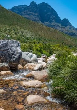 Clear rocky mountain stream Stock Photos