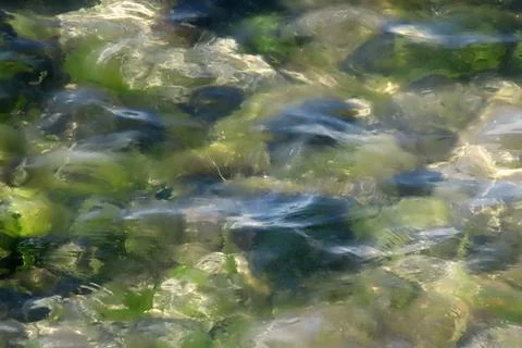 Clear Sea Background with Rocks Stock-Fotos