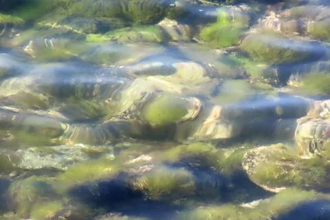 Clear Sea Background with Rocks Stock-Fotos