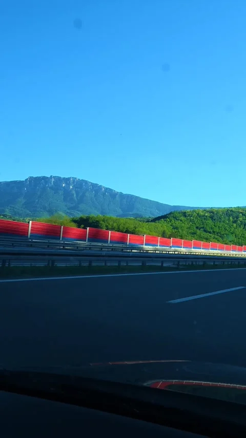 Clear sky above winding road. Balkans, Serbia. Vertical Stock Footage 337494717