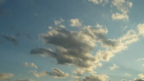 Clear sky with fluffy clouds timelapse. Time lapse footage of white clouds with Stock Footage 251731014