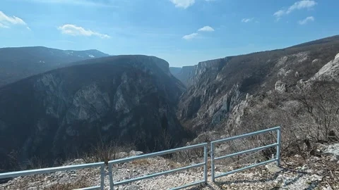 Clear sky glows above rugged canyon walls. Balkan, Eastern Europe, POV Stock Footage 331452309
