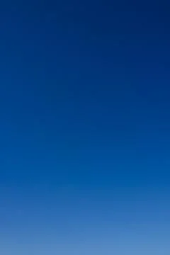 Clear sky as gradient or background. Azure sky without clouds. Stock Photos