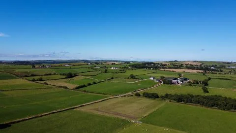 Clear sky over the fields of southern Ireland. Picturesque summer landscape. Stock Photos