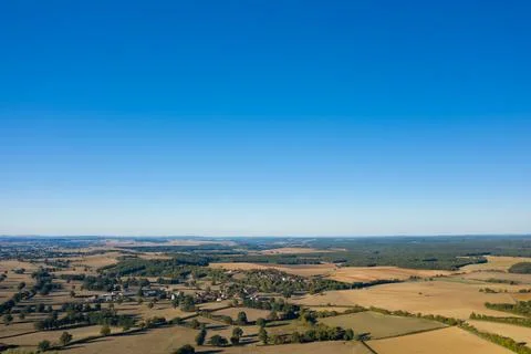 Clear sky over rural patchwork fields in France 스톡 사진