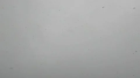 Clear sky snow falling winter flakes wide angle 4K Video stock 154003475