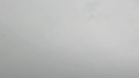 Clear sky snow falling winter flakes wide angle 4K Stock Footage 154003476