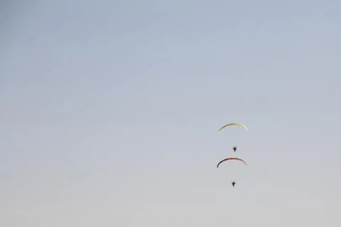 Clear sky with two para planes flying 写真素材
