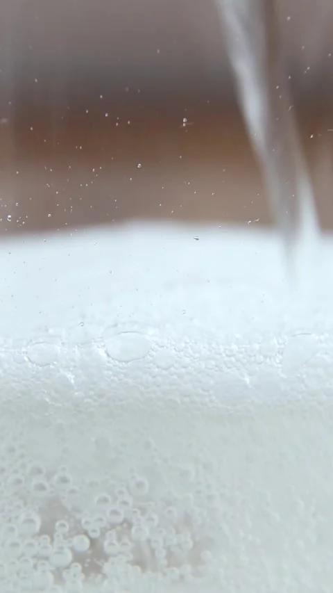 Clear sparkling water pouring with bubbles ASMR relaxation Stock Footage 313253566