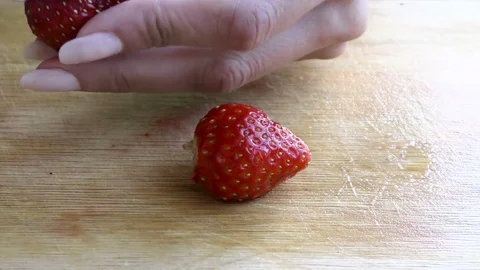 Clear the strawberries Stock Footage