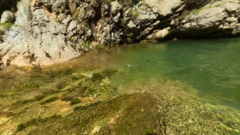 Clear stream flows through rocky canyon. Gradasnica River Canyon, Serbia Stock Footage 342321375