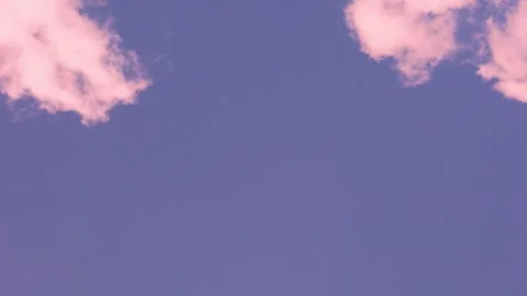 Clear Sunset Lilac Sky and Few Puffy Cotton Pink Clouds in Sunlight Time Lapse.  Video stock 317820944