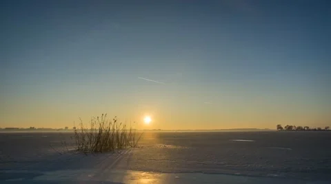 Clear sunset over a freezing lake in the suburbs of Bucharest Stock Footage 45986834