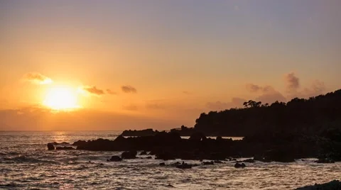 Clear sunset at the shore over the rocks  | 4K time lapse Stock Footage 42904980