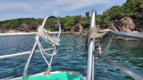 Clear Teal Seascape, Cliffs &amp; Boats Stock Footage 264994723