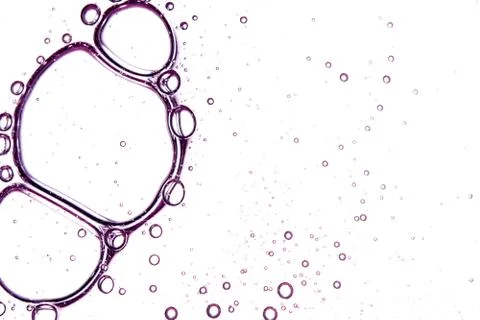 Clear texture of lilac bubbles on a light background Stock Photos