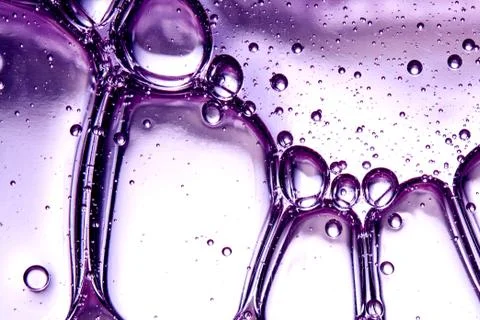 Clear texture of lilac bubbles on a light background Stock Photos