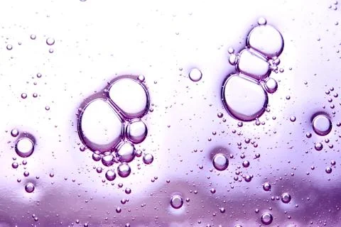 Clear texture of purple bubbles on a light background Stock Photos