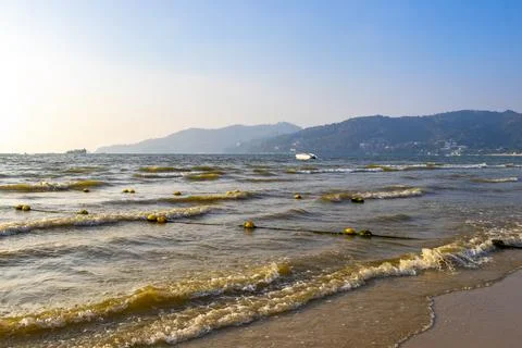 Clear turquoise blue waves wave water and beach sand Thailand. 스톡 사진