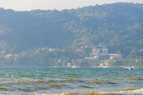Clear turquoise blue waves wave water and beach sand Thailand. 写真素材