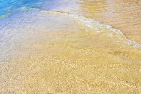 Clear turquoise blue waves wave water and beach sand Thailand. Stock-Fotos