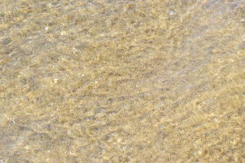 Clear turquoise blue waves wave water and beach sand Thailand. Stock Photos
