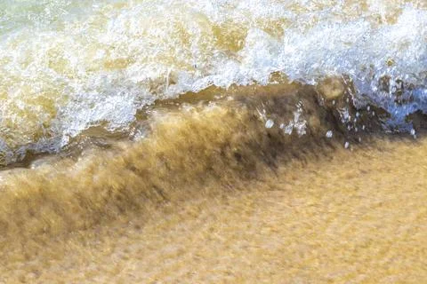 Clear turquoise blue waves wave water and beach sand Thailand. Stockfoto's