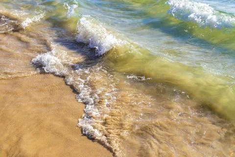 Clear turquoise blue waves wave water and beach sand Thailand. 스톡 사진