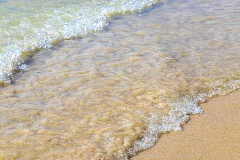 Clear turquoise blue waves wave water and beach sand Thailand. 写真素材