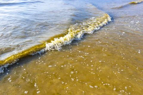 Clear turquoise blue waves wave water and beach sand Thailand. 스톡 사진