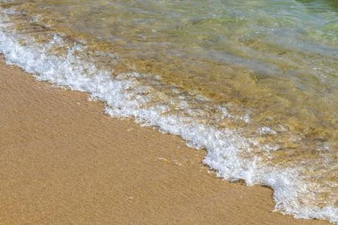Clear turquoise blue waves wave water and beach sand Thailand. 스톡 사진