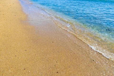 Clear turquoise blue waves wave water and beach sand Thailand. Stock-Fotos