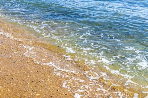 Clear turquoise blue waves wave water and beach sand Thailand. Stock-Fotos