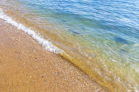 Clear turquoise blue waves wave water and beach sand Thailand. Stock-Fotos