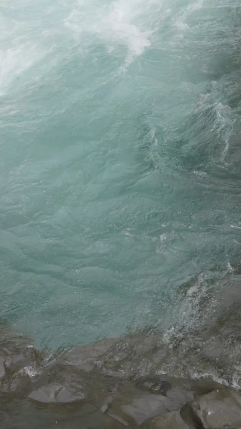 Clear Turquoise River Water Flowing Over Rocks Stock Footage 308577112