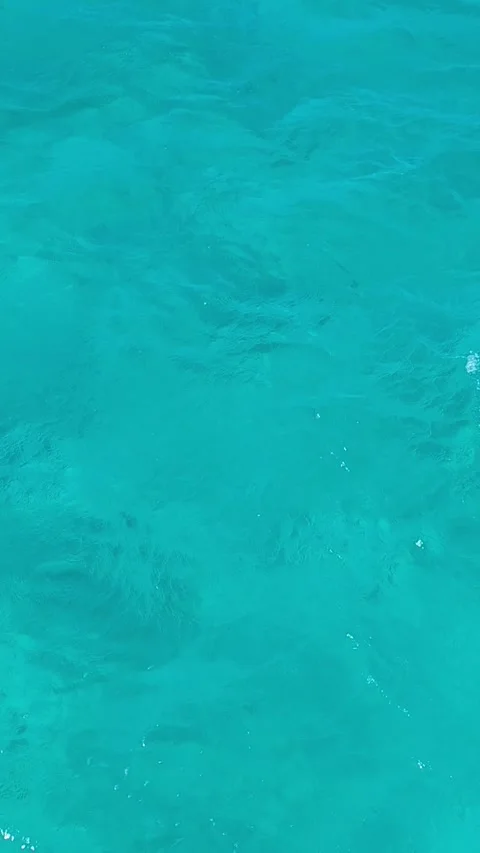 Clear turquoise sea water surface with gentle ripples in Red Sea Egypt Stock Footage 341345556