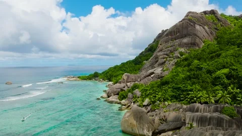 Clear turquoise waters and granite rocks. Seychelles, La Digue. Stock Footage 307566169