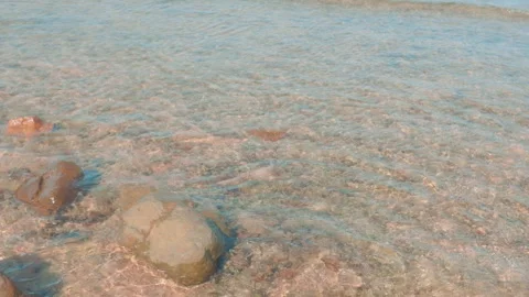Clear Turquoise Waves Rolling Over Rocky Shoreline, Red Sea Egypt Stock Footage 343181883