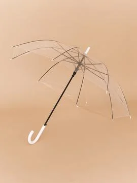 Clear umbrella open side view with white handle Stock Photos
