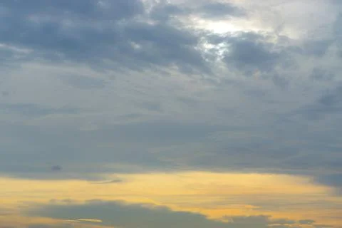 Clear warm sky with white cloud background in the sunset time. warm light sky Stock Photos