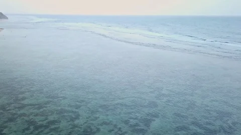 Clear Water along the cliffs in bali Stock Footage 80842639