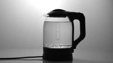 Clear water bubble inside electric glass kettle Video stock 342520245