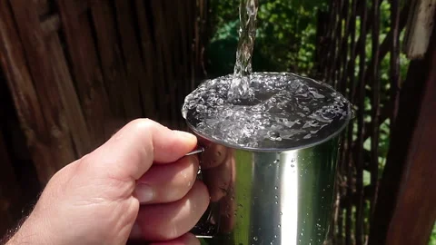 Clear water to cup Stock Footage 111649198