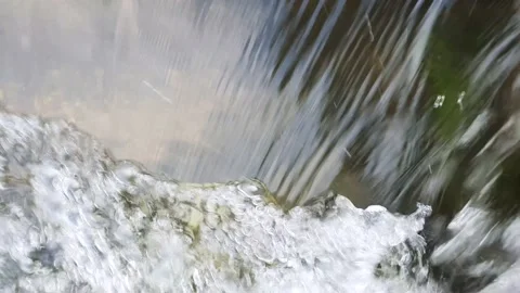 Clear water falling and white bubbles Stock Footage 145711708
