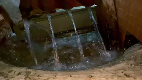 Clear Water Flow from Pipe Channel at Night Stock Footage 292122836